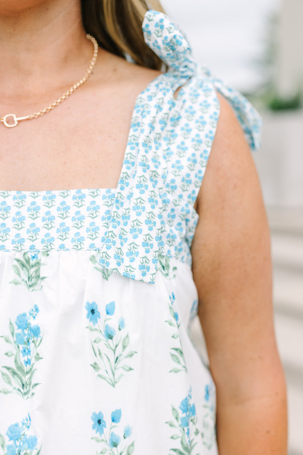 Plus Size white and blue floral print tank top with tie-shoulder straps and a square neckline.