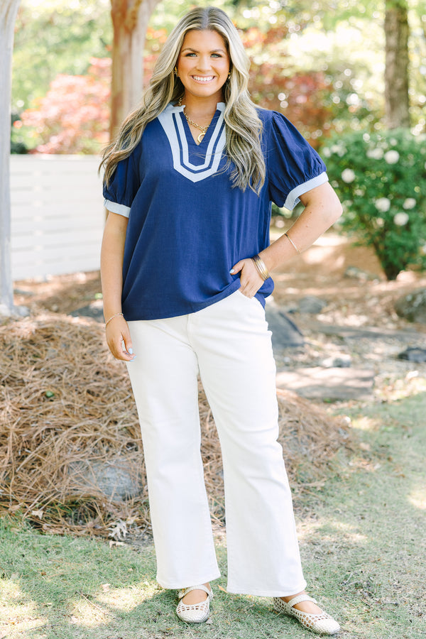 Chic Soul plus size clothing, navy short puff sleeve top with v neck cutout and light blue trim around the neckline and sleeves