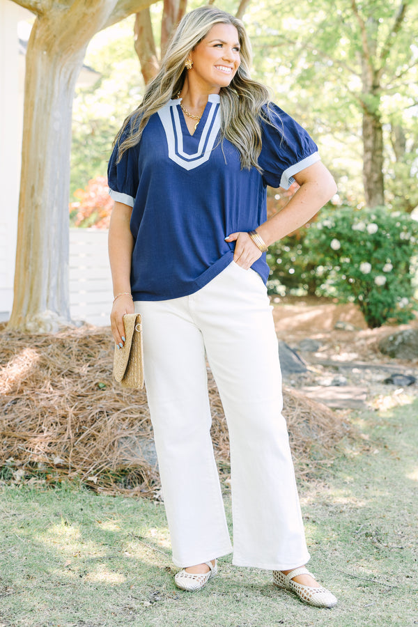 Chic Soul plus size clothing, navy short puff sleeve top with v neck cutout and light blue trim around the neckline and sleeves