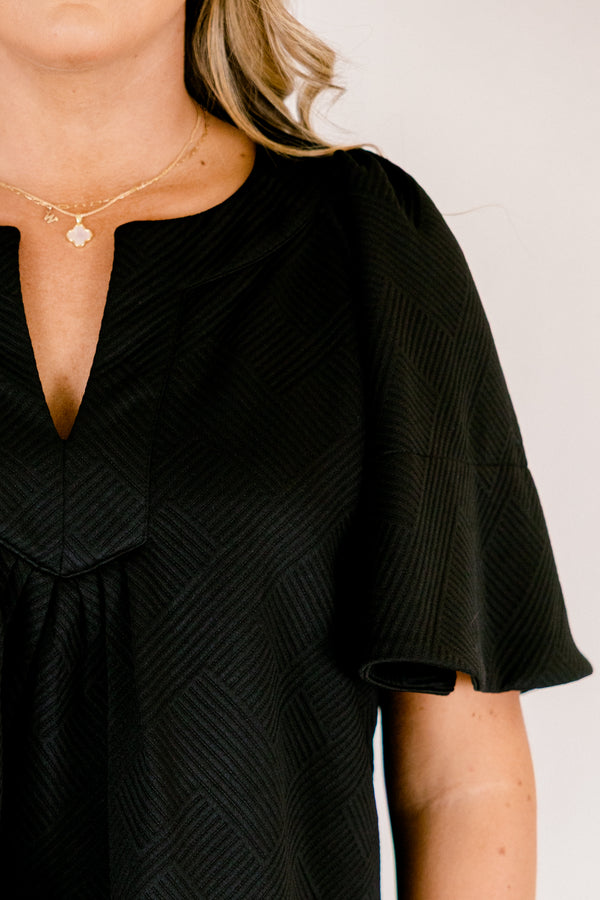 Chic Soul plus size clothing, black short flowy sleeve top with v-neckline and textured pattern