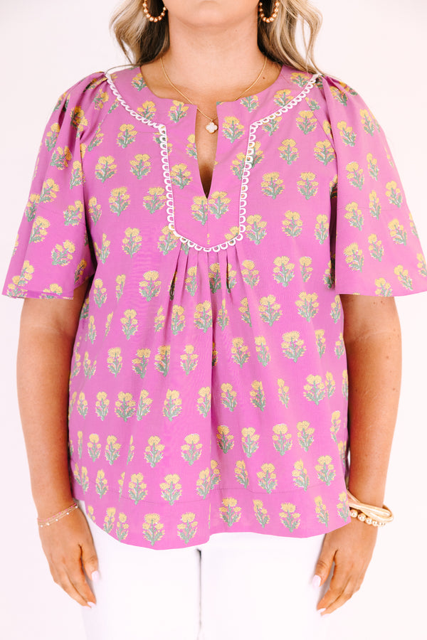 Chic Soul plus size clothing, pink short bell sleeve top with green and yellow floral block pattern and a v neck cutout with piping detailing along the neckline