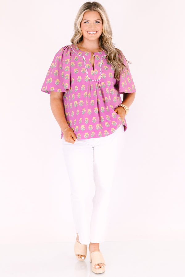 Chic Soul plus size clothing, pink short bell sleeve top with green and yellow floral block pattern and a v neck cutout with piping detailing along the neckline