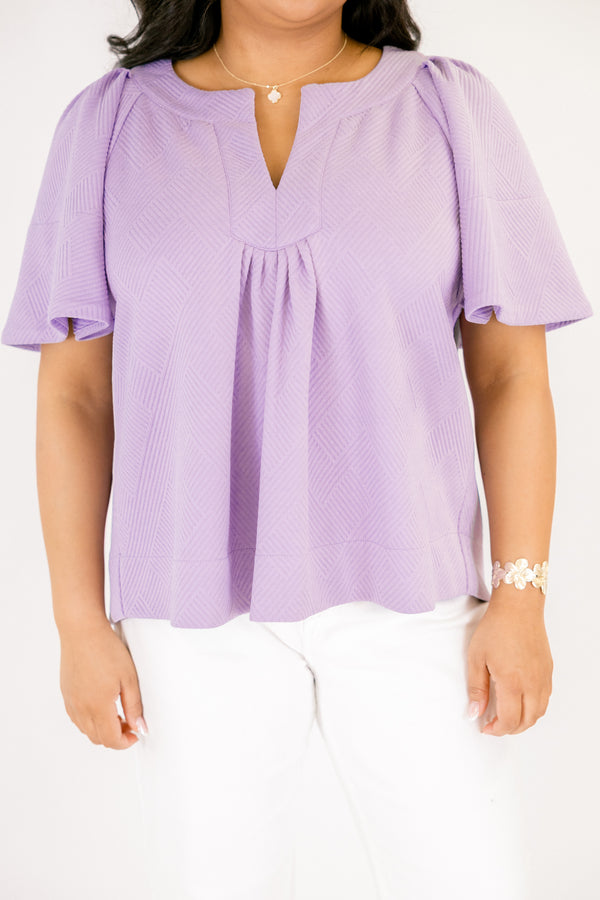Chic Soul plus size clothing, a top featuring a full hem and butterfly sleeves, there is stitching to highlight the hem on both the shirt and sleeves. the material of the garment is textured 