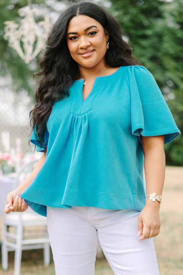 Chic Soul plus size clothing, teal short flowy sleeve top with v-neckline and textured pattern throughout the top