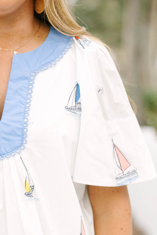 Chic Soul plus size clothing, white short flutter sleeve short sleeve top with v-neckline outlined in blue and small sailboat graphics 