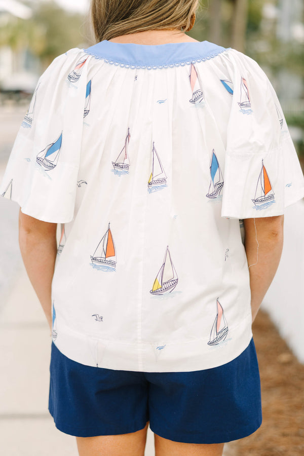 Chic Soul plus size clothing, white short flutter sleeve short sleeve top with v-neckline outlined in blue and small sailboat graphics 