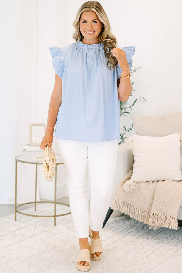 Plus Size blue and white pinstripe top with a ruffled high neckline and flutter sleeves.