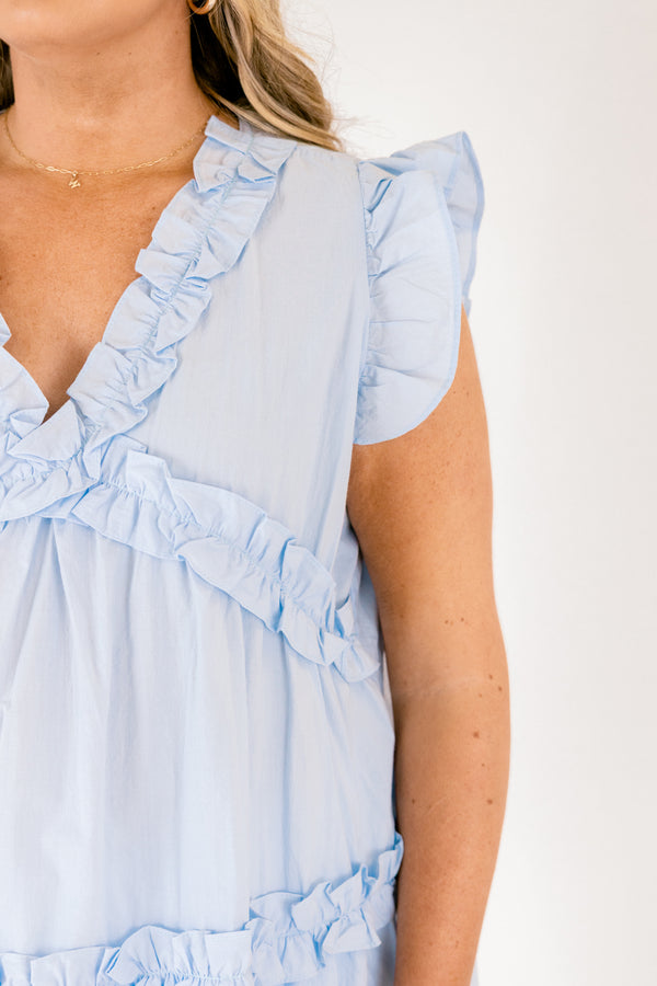 Short-flutter-sleeve light blue ruffled baby doll top with a v-neckline