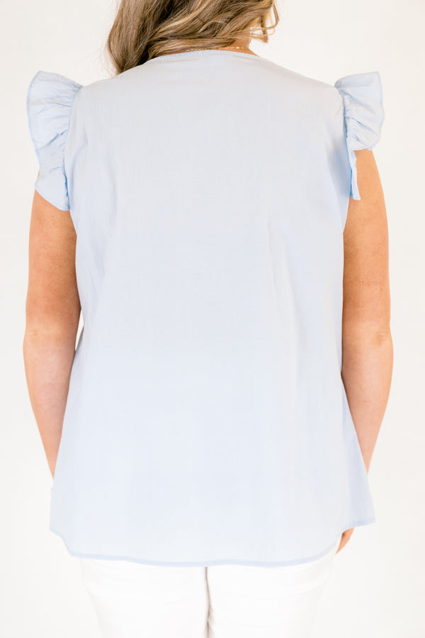 Short-flutter-sleeve light blue ruffled baby doll top with a v-neckline