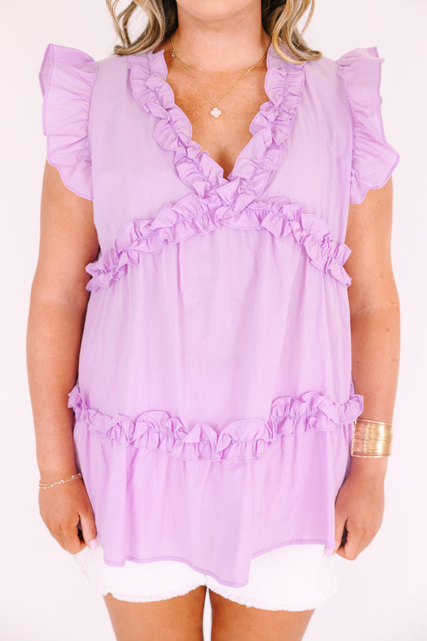 Chic Soul plus size clothing, purple top with flutter sleeves and ruffle detailing going along the v-neckline and under the chest as well as a ruffle stripe going across the bottom of the top 