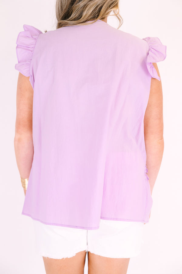 Chic Soul plus size clothing, purple top with flutter sleeves and ruffle detailing going along the v-neckline and under the chest as well as a ruffle stripe going across the bottom of the top 