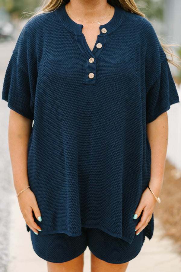 Chic Soul plus size clothing, navy blue short sleeve knit top with four wooden buttons along the v-neckline and navy blue shorts with elastic waistband to make a matching set