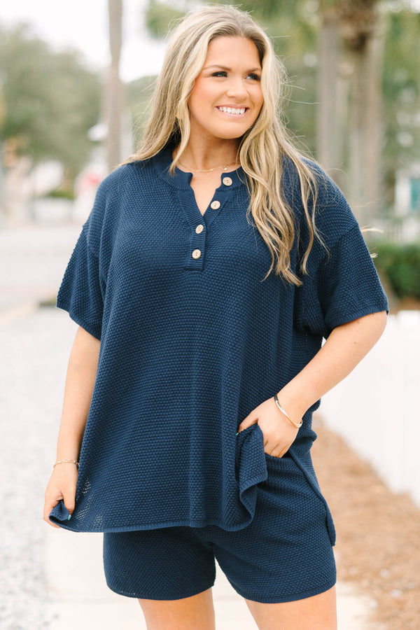 Chic Soul plus size clothing, navy blue short sleeve knit top with four wooden buttons along the v-neckline and navy blue shorts with elastic waistband to make a matching set