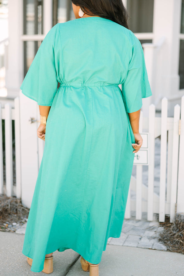 Chic Soul plus size clothing, turquoise button-up maxi dress with half sleeves a slight v-neckline and a drawstring belt that ties in a bow in the middle of the waist 
