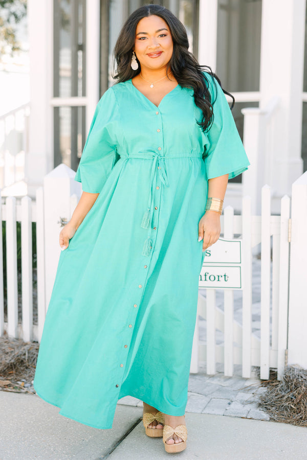 Chic Soul plus size clothing, turquoise button-up maxi dress with half sleeves a slight v-neckline and a drawstring belt that ties in a bow in the middle of the waist 