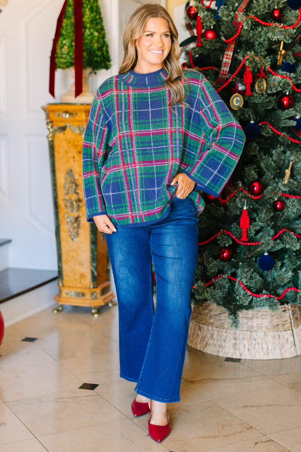 Plus Size navy plaid sweater with a mock neckline, long sleeves, and a relaxed fit.