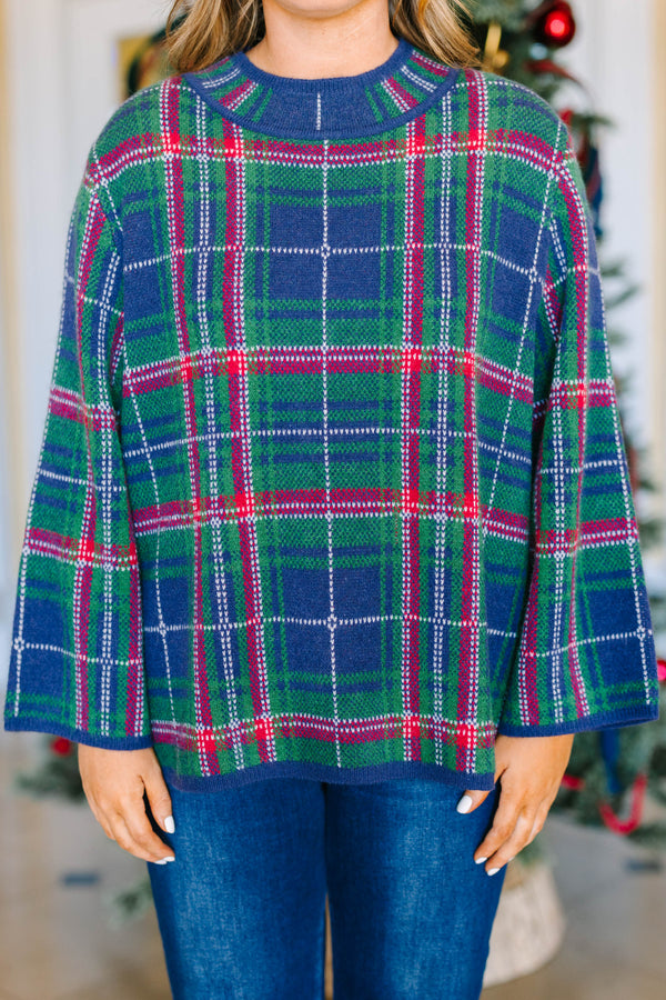 Plus Size navy plaid sweater with a mock neckline, long sleeves, and a relaxed fit.