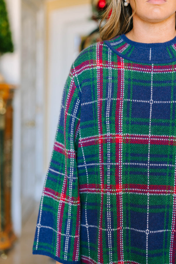 Plus Size navy plaid sweater with a mock neckline, long sleeves, and a relaxed fit.