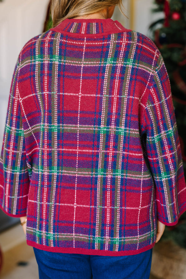 Plus Size red plaid sweater with a crew neckline, long bell sleeves, and a relaxed fit.