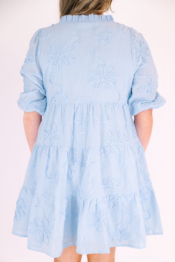 Chic Soul plus size clothing, light blue short puff sleeve tiered baby doll dress with 3 buttons and a v neckline and floral patterned texturing 

