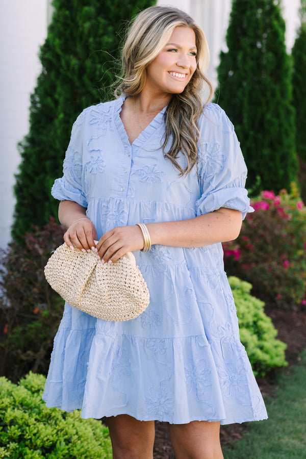 Chic Soul plus size clothing, light blue short puff sleeve tiered baby doll dress with 3 buttons and a v neckline and floral patterned texturing 
