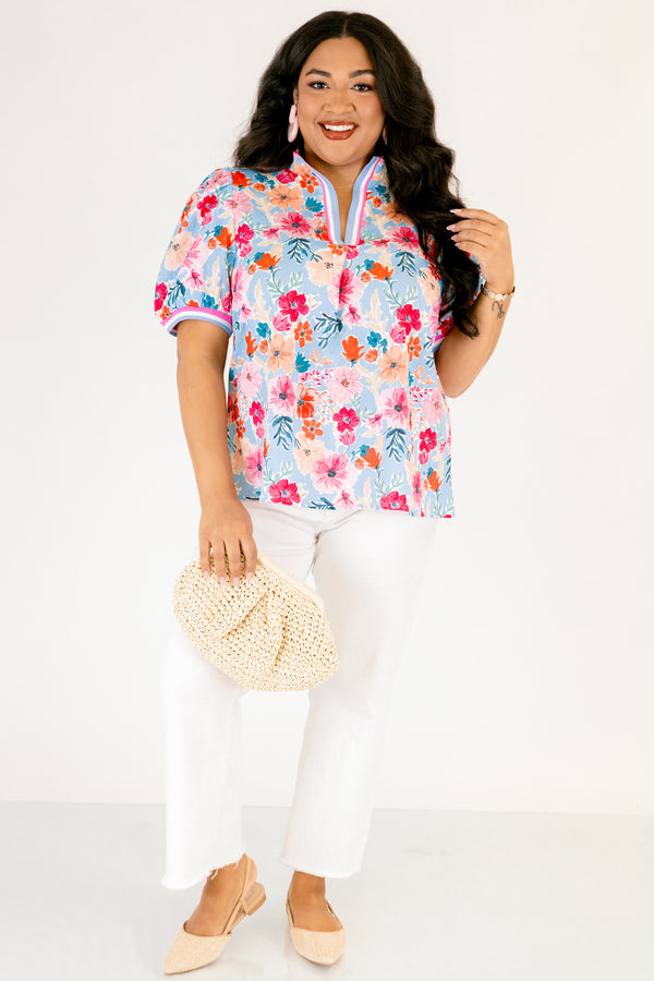Chic Soul plus size clothing, light blue short sleeve top with pink red and orange floral design through top and blue white and pink stripe hemline along the bottom of the sleeves and bordering the v-neckline