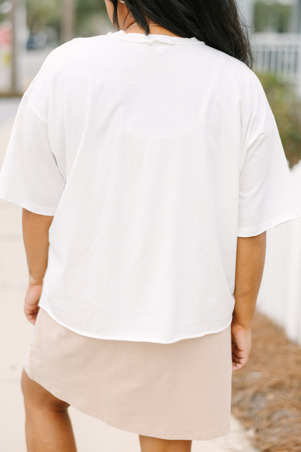 Chic Soul plus size clothing, white short sleeve graphic tee with a teddy bear graphic on the center of the shirt that is wearing an American flag pullover and jeans 