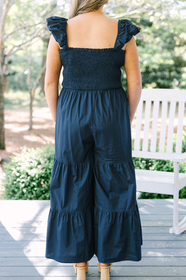 Chic Soul plus size clothing, dark navy blue ruffle tank top, wide-leg tiered jumpsuit with cinching on the bodice 
