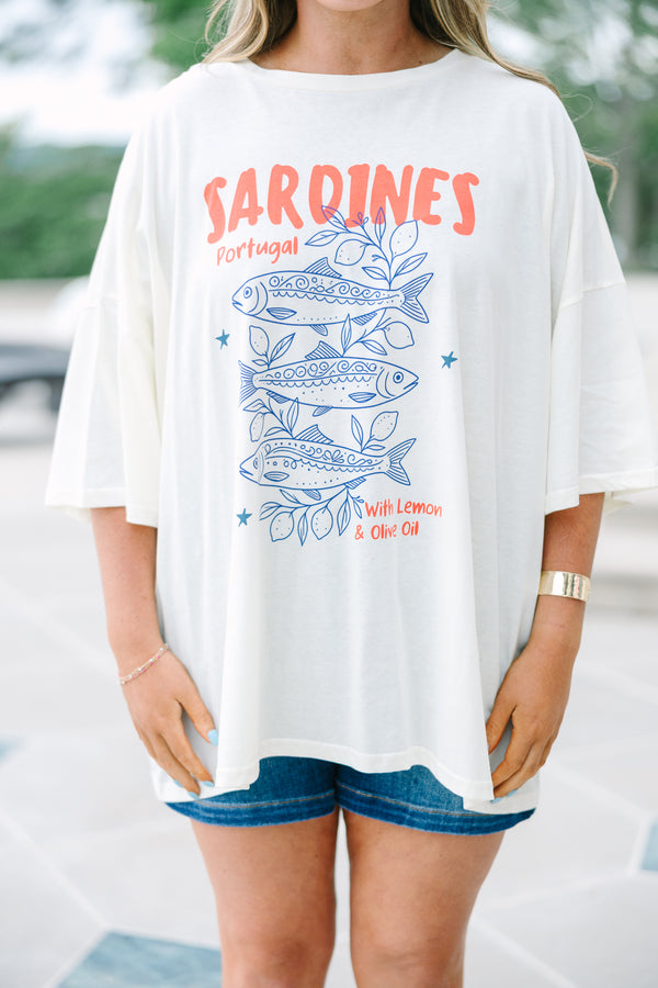 Plus Size ivory boyfriend tee with a blue sardine graphic and red text, paired with denim shorts.