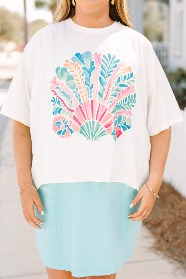 Chic Soul plus size clothing, white cropped tee with a multi colored abstract patterned sea shell in the middle