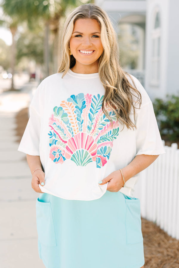 Chic Soul plus size clothing, white cropped tee with a multi colored abstract patterned sea shell in the middle