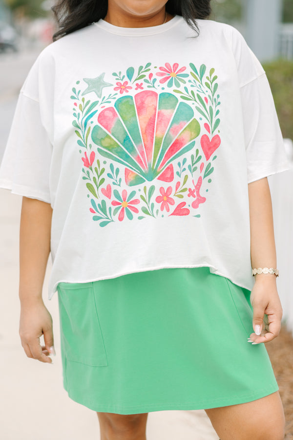Chic Soul plus size clothing, white short sleeve cropped vintage wash tee with with pastel watercolor pink green and turquoise seashell and flowers on the front of the tee