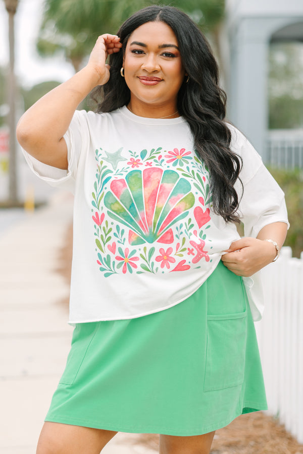 Chic Soul plus size clothing, white short sleeve cropped vintage wash tee with with pastel watercolor pink green and turquoise seashell and flowers on the front of the tee