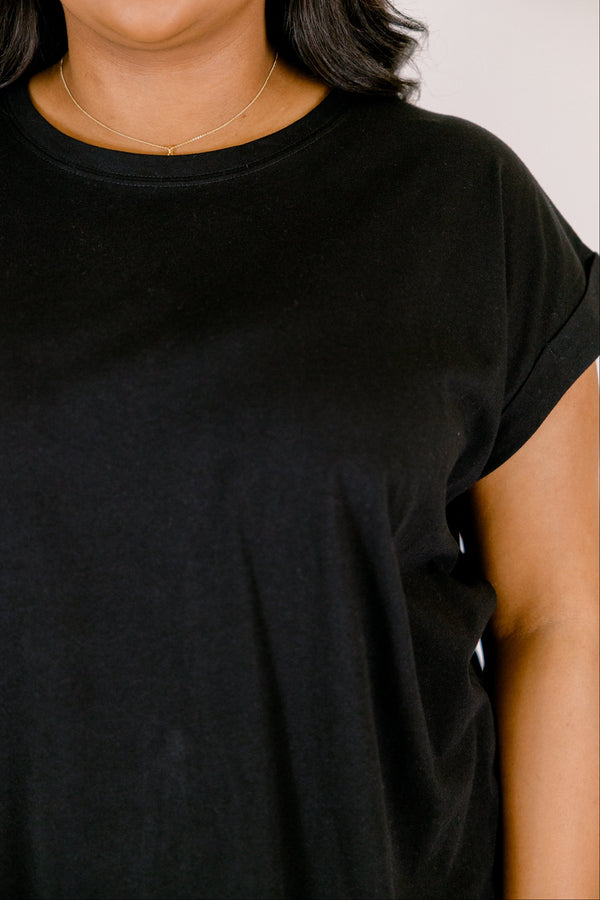 black tee with cuffed short sleeves and a round neckline