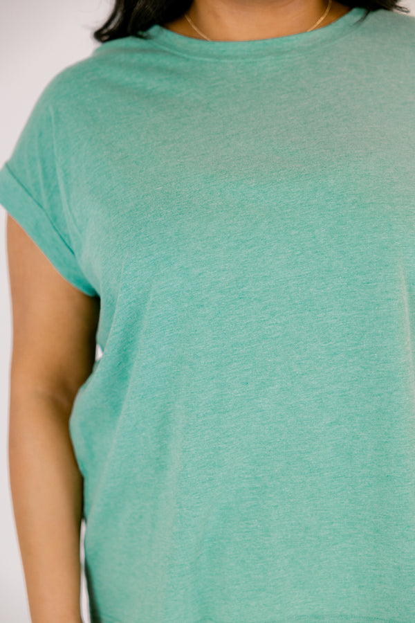 heather kelly green tee with cuffed short sleeves and a round neckline