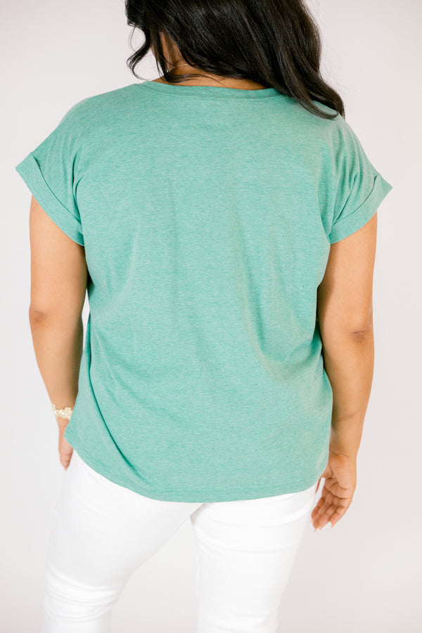 heather kelly green tee with cuffed short sleeves and a round neckline