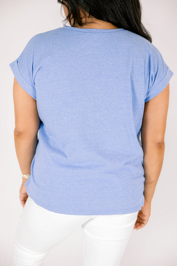 heather ocean blue tee with cuffed short sleeves and a round neckline