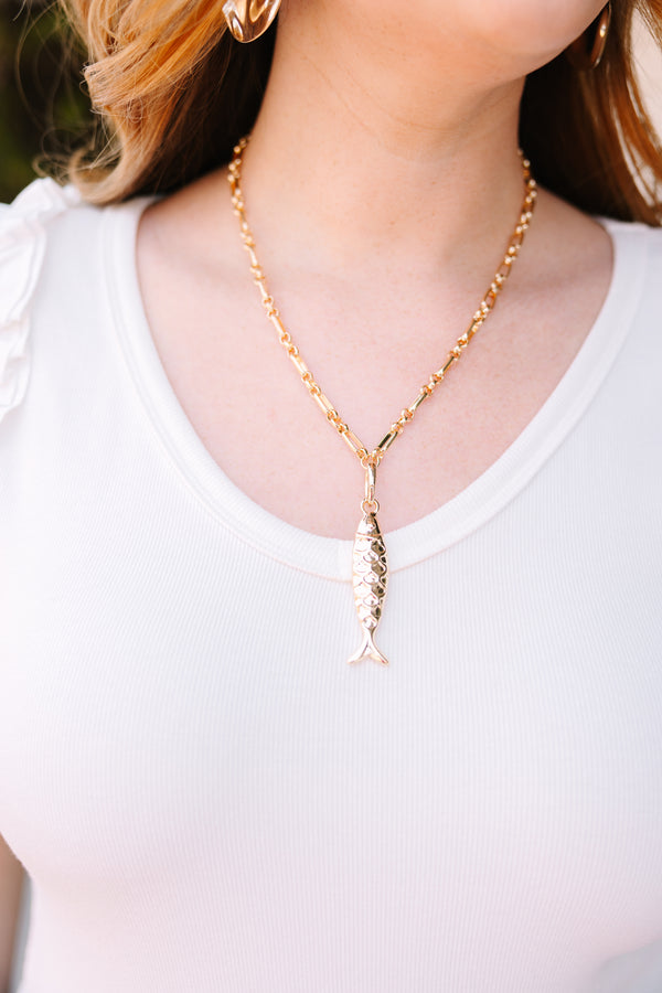 Chic Soul plus size clothing, gold chain necklace with a sold gold fish charm hanging vertically on the middle of the chain 