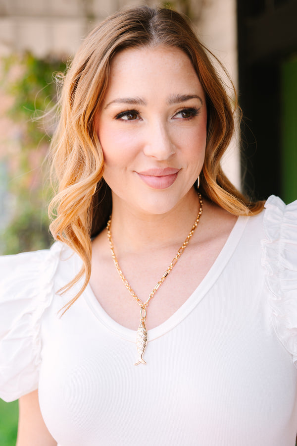 Chic Soul plus size clothing, gold chain necklace with a sold gold fish charm hanging vertically on the middle of the chain 