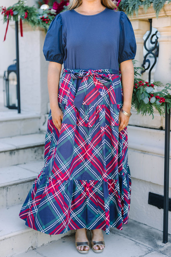 Plus Size navy blue short puff sleeve dress with a tiered plaid maxi skirt and waist tie.