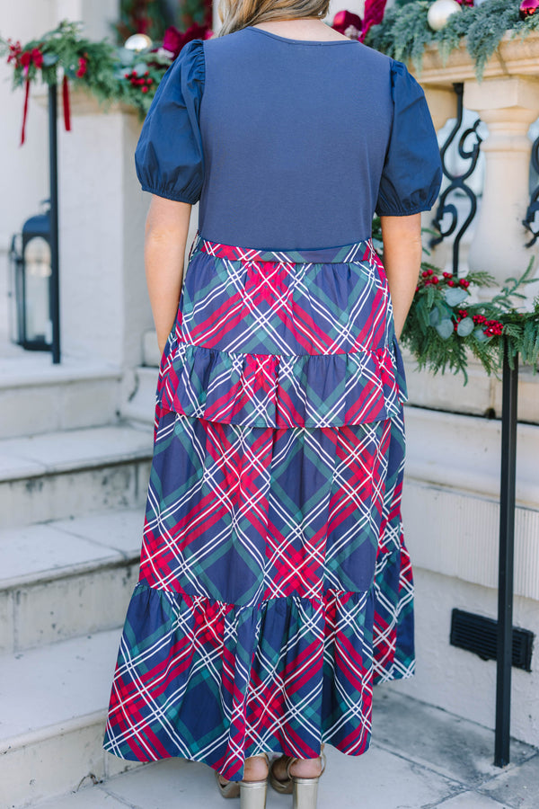 Plus Size navy blue short puff sleeve dress with a tiered plaid maxi skirt and waist tie.