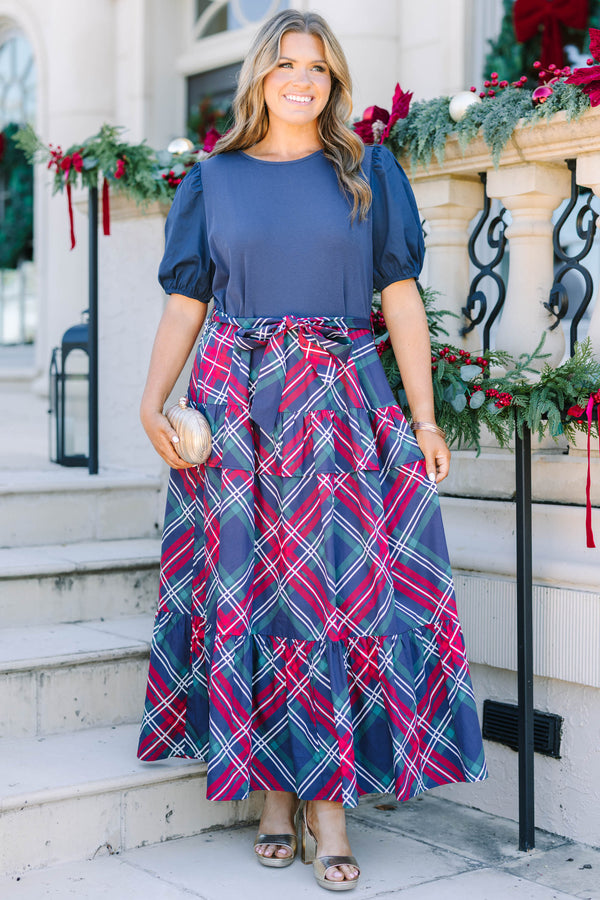 Plus Size navy blue short puff sleeve dress with a tiered plaid maxi skirt and waist tie.