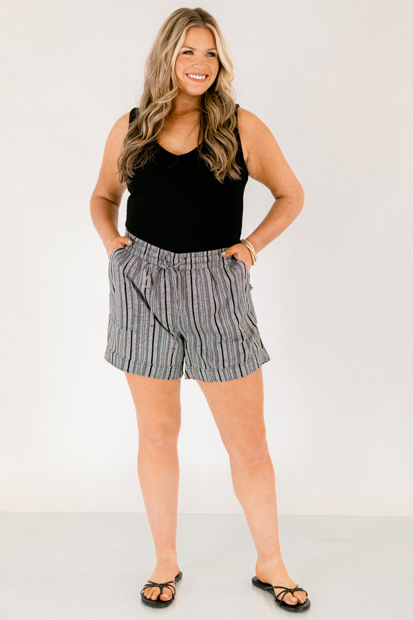Chic Soul plus size clothing, gray striped shorts with pockets on the front of the shirts ad a draw string waistband that has a bow that ties in the center of the shorts 