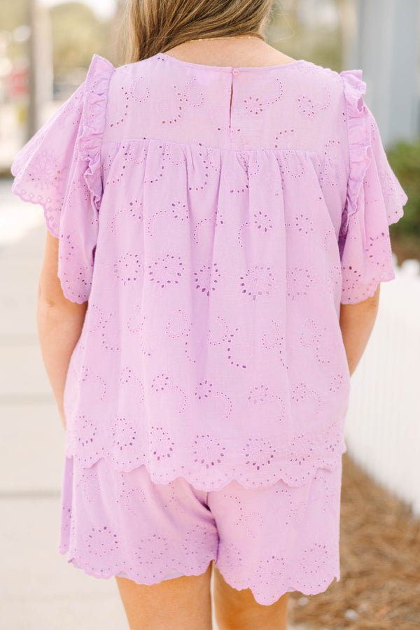 Chic Soul plus size clothing, light purple short flutter sleeve top with eyelet pattern and a high-scoop-neckline and a scalloped edge at the bottom of the top