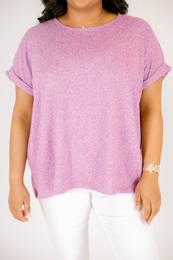 Light plum colored tee with short cuffed sleeves and a round neckline