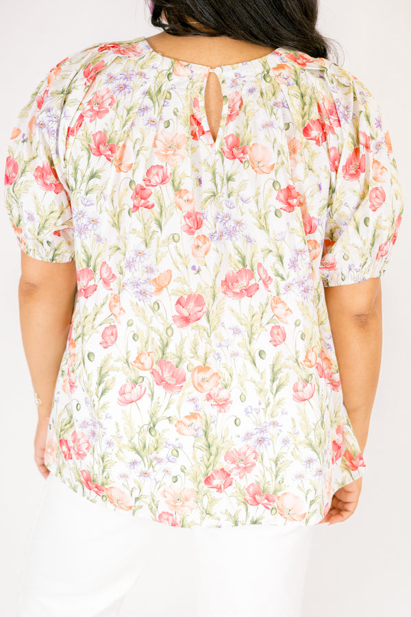 Chic Soul plus size clothing, white top with short bubble sleeves that has a green floral pattern throughout 