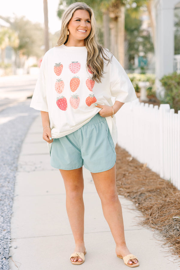 Chic Soul plus size clothing, white short sleeve boyfriend tee with nine red and pink strawberry graphics on the front