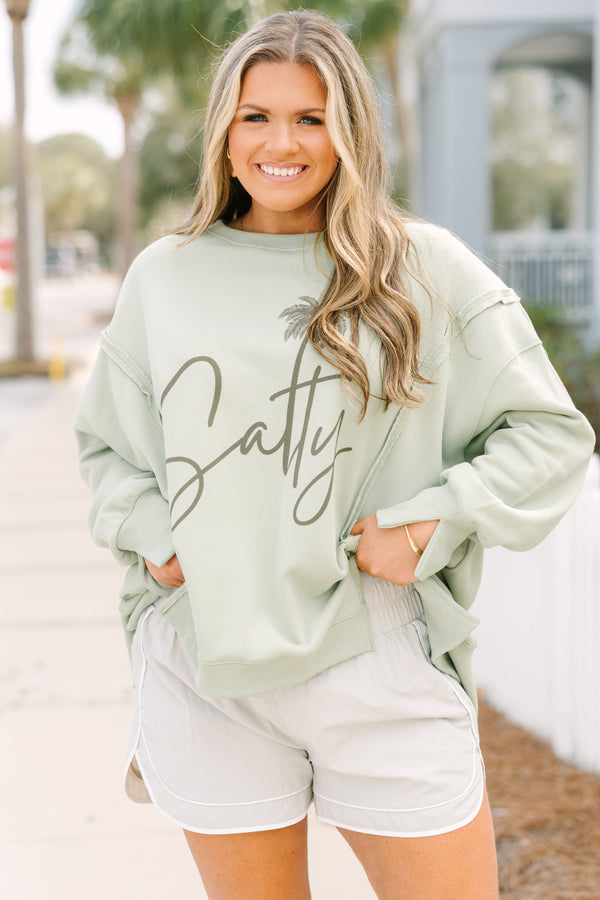 Chic Soul plus size clothing, light tan athletic shorts with a stretchy high waistband as well as a white outlining the bottom of the shorts and up the sides 

