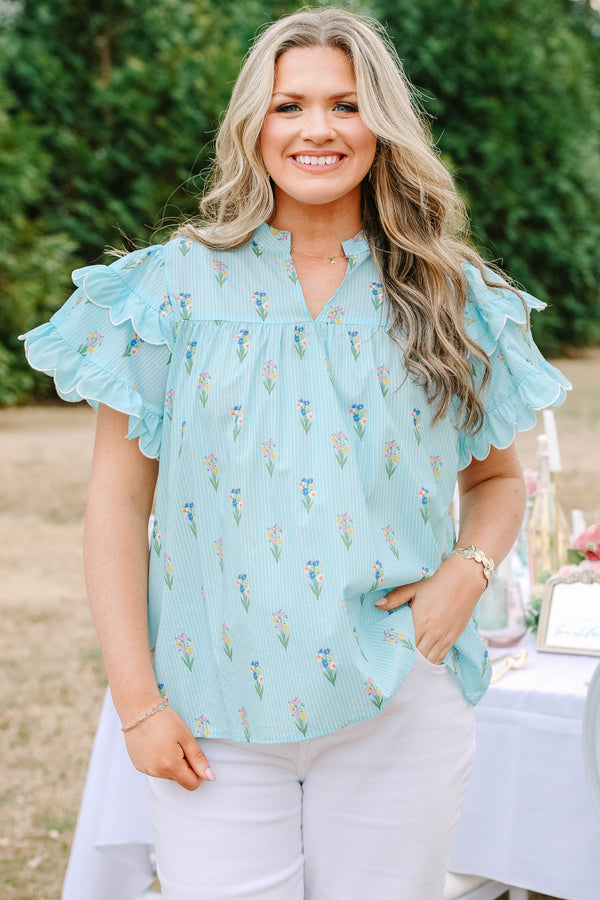 Chic Soul plus size clothing, light aqua blue short ruffle sleeve top with v-neckline and small orange, purple, green, and yellow floral print on vertical white pin stripe pattern
