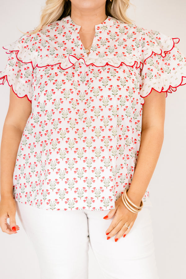Chic Soul plus size clothing, white short flutter sleeve top with pink and green small floral pattern and pink scallop trimming along the sleeves through the top